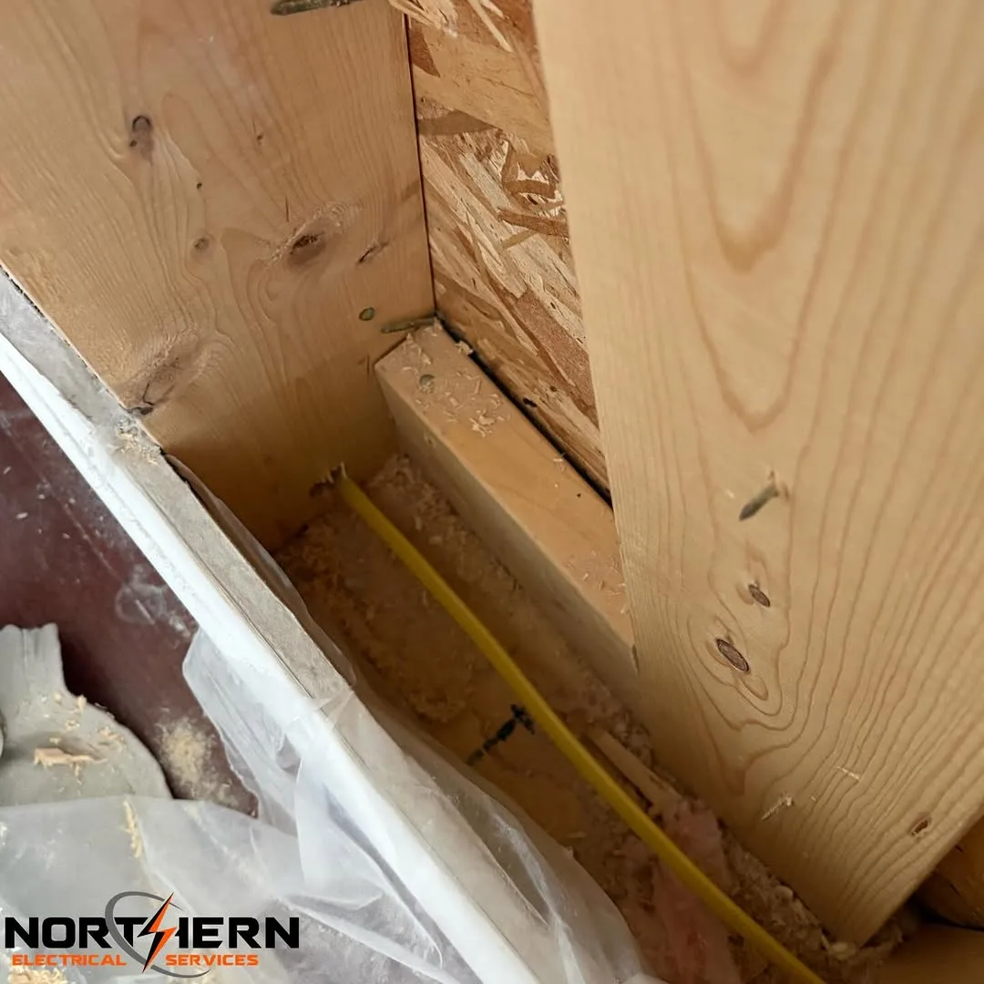 Romex wire run through framing